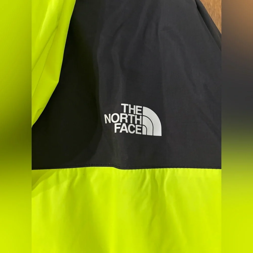 The North Face Neon Yellow and Black Windbreaker Coat